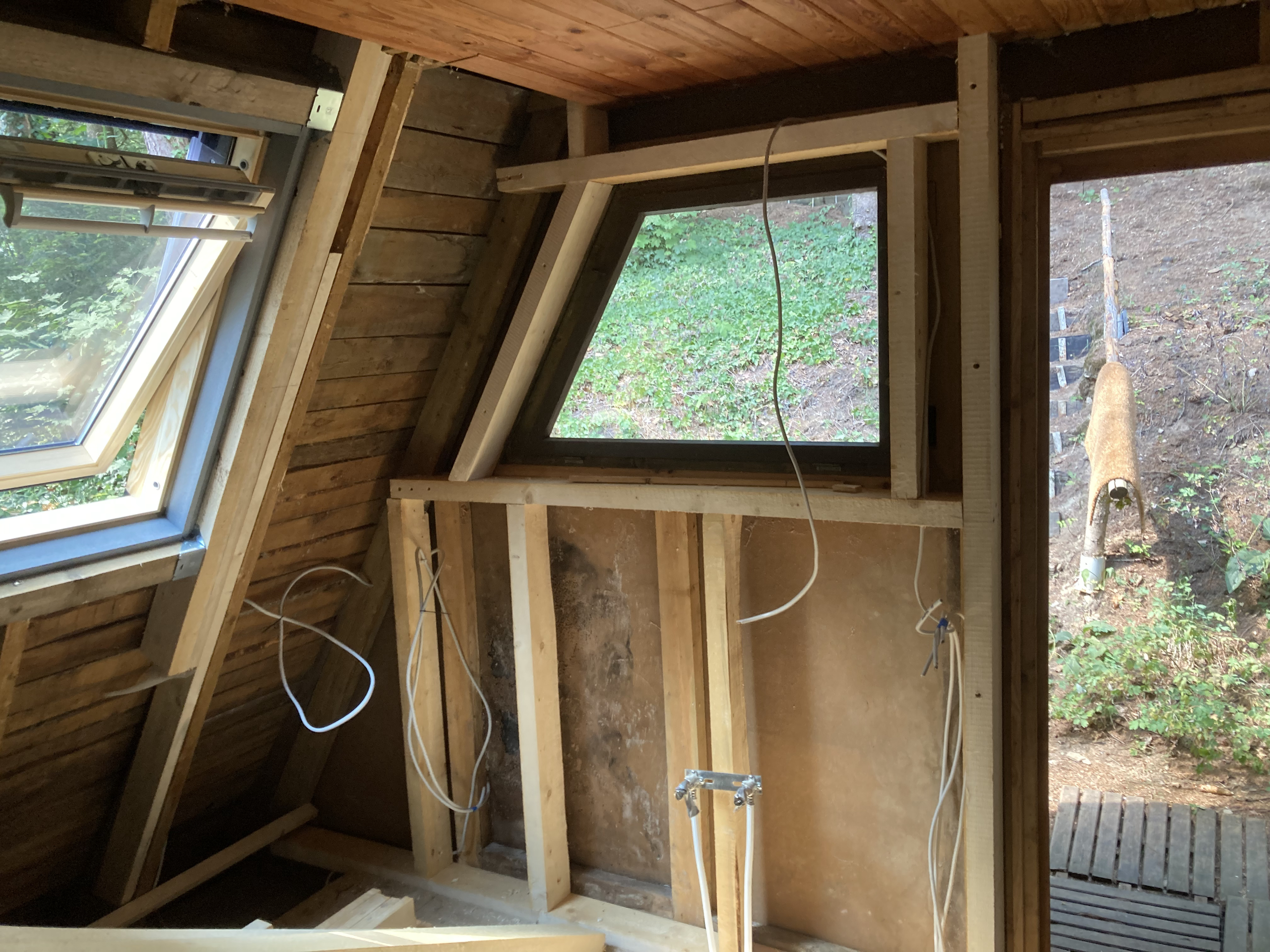 Trapezoid kitchen window with new framework for new windows